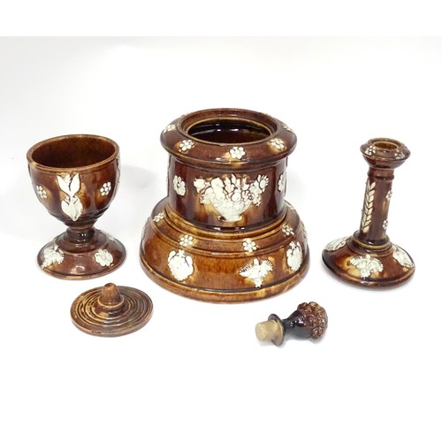 55 - A Victorian Measham bargeware smoker's compendium comprising candlestick, goblet, tobacco jar and ta... 