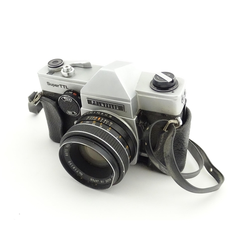 53 - A Prinzflex Super TTL camera with 55 mm f1.7 lens M42 screw mount together with a Rollei E 15B Elect... 