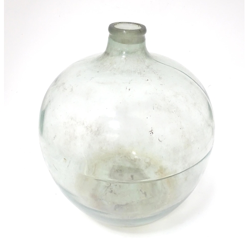 65 - A large glass carboy / demijohn bottle, approx 20