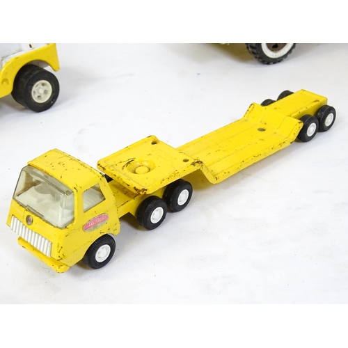 70 - Toys: A quantity of Tonka Toys construction vehicles to include a yellow Car Carrier, Claw Crane, a ... 