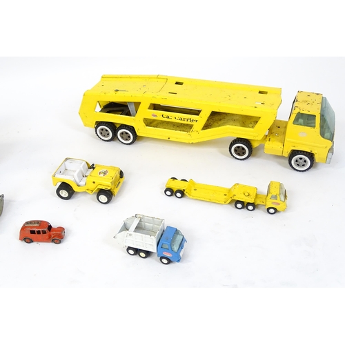 70 - Toys: A quantity of Tonka Toys construction vehicles to include a yellow Car Carrier, Claw Crane, a ... 