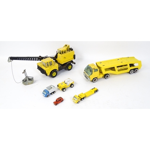 70 - Toys: A quantity of Tonka Toys construction vehicles to include a yellow Car Carrier, Claw Crane, a ... 