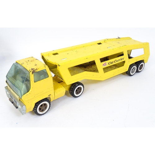 70 - Toys: A quantity of Tonka Toys construction vehicles to include a yellow Car Carrier, Claw Crane, a ... 