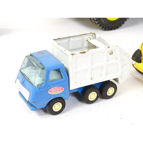 70 - Toys: A quantity of Tonka Toys construction vehicles to include a yellow Car Carrier, Claw Crane, a ... 