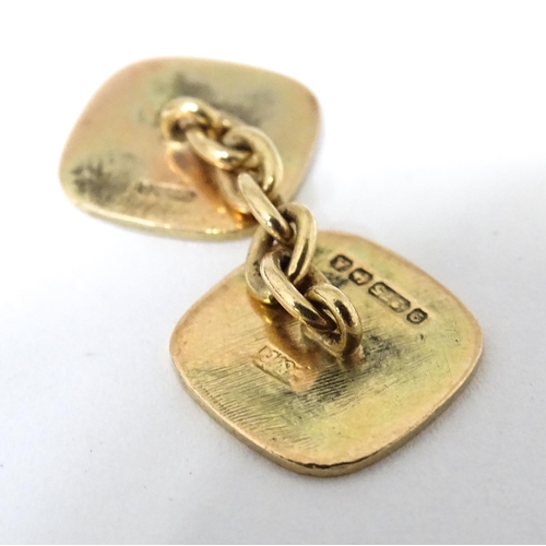 449 - A single 9ct gold cufflink with engraved decoration