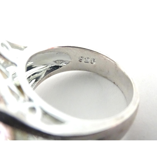 452 - A quantity of silver and white metal dress/ cocktail rings (11)