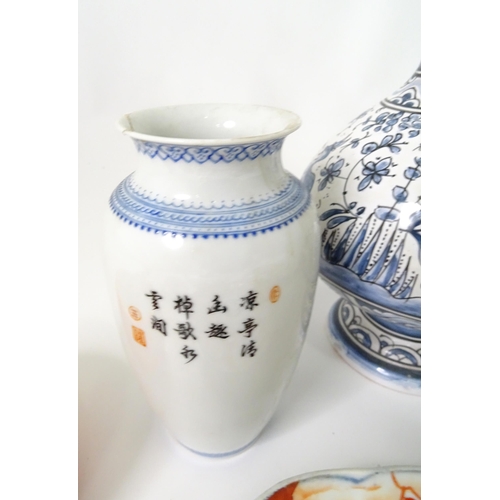 797 - A quantity of assorted ceramics to include a Portuguese blue and white bottle vase with stopper, an ... 