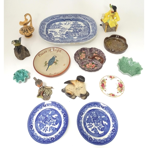 804 - A quantity of assorted ceramics to include a blue and white Willow pattern meat plate, a jug with sh... 