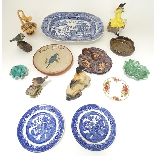 804 - A quantity of assorted ceramics to include a blue and white Willow pattern meat plate, a jug with sh... 