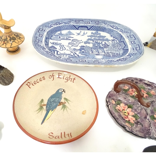 804 - A quantity of assorted ceramics to include a blue and white Willow pattern meat plate, a jug with sh... 