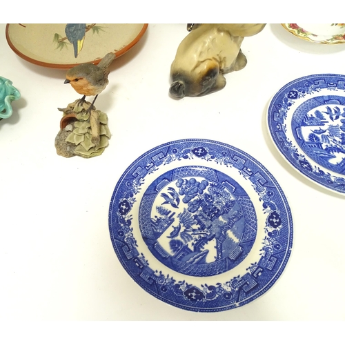 804 - A quantity of assorted ceramics to include a blue and white Willow pattern meat plate, a jug with sh... 