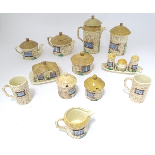 839 - A quantity of Sylvac cottage wares to include teapot, hot water pot, butter dish, sugar pot, cruet s... 