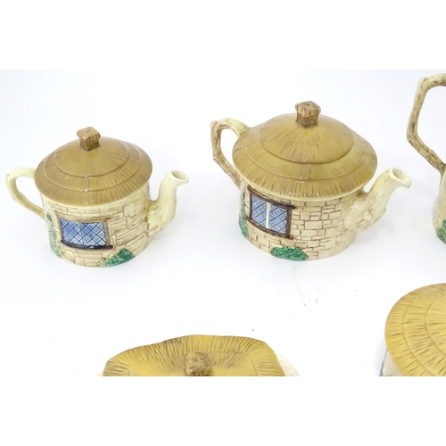 839 - A quantity of Sylvac cottage wares to include teapot, hot water pot, butter dish, sugar pot, cruet s... 