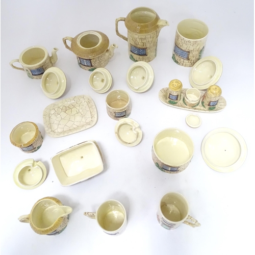 839 - A quantity of Sylvac cottage wares to include teapot, hot water pot, butter dish, sugar pot, cruet s... 