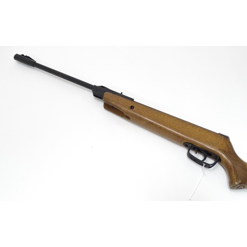 11 - A Gamo youth .177 / 4.5mm air rifle, beech pistol-grip stock with chequering, 15