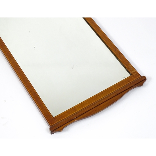 13 - An early 20thC mahogany wall mirror with satinwood marquetry decoration. 19