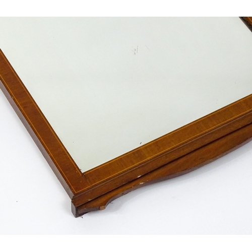 13 - An early 20thC mahogany wall mirror with satinwood marquetry decoration. 19