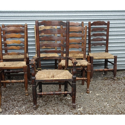 15 - Thirteen assorted 19thC ash and rush seated ladderback dining chairs, to include three carvers, the ... 