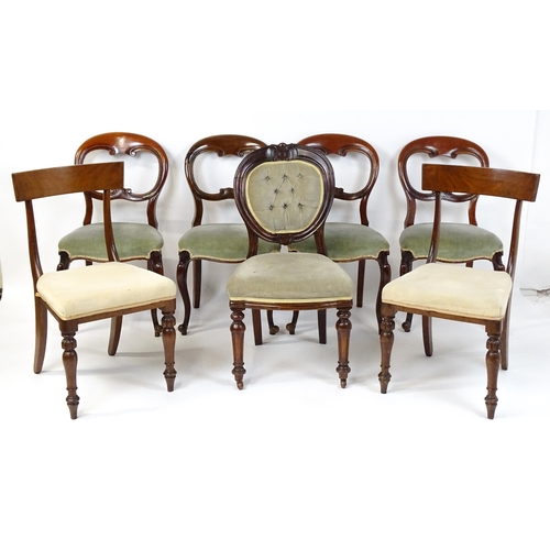 33 - A group of seven chairs to include four mahogany balloon backs, a deep buttoned side chair and two 1... 