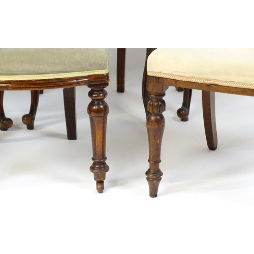 33 - A group of seven chairs to include four mahogany balloon backs, a deep buttoned side chair and two 1... 