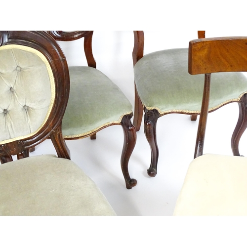 33 - A group of seven chairs to include four mahogany balloon backs, a deep buttoned side chair and two 1... 