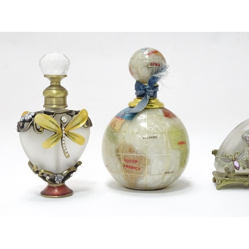 81 - Five assorted snuff bottles, one with globe detail. Largest approx. 3 3/4