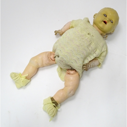 847 - Toys: An Armand Marseille doll / doll parts comprising a bisque head having blinking eyes, painted l... 