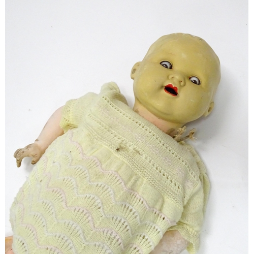 847 - Toys: An Armand Marseille doll / doll parts comprising a bisque head having blinking eyes, painted l... 