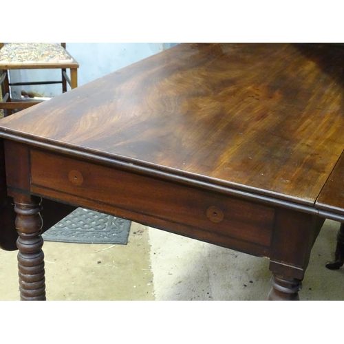 26 - A 19thC mahogany Pembroke table with single drawer, standing on four turned legs, the top approx 44