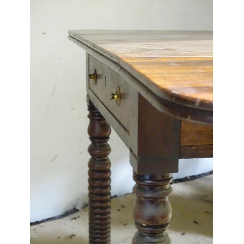 26 - A 19thC mahogany Pembroke table with single drawer, standing on four turned legs, the top approx 44