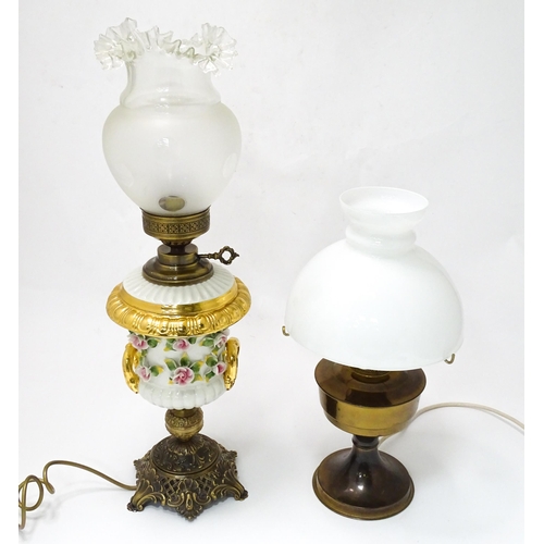 820 - Two electric table lamps formed as oil lamps, the
the largest approx 27