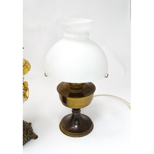 820 - Two electric table lamps formed as oil lamps, the
the largest approx 27