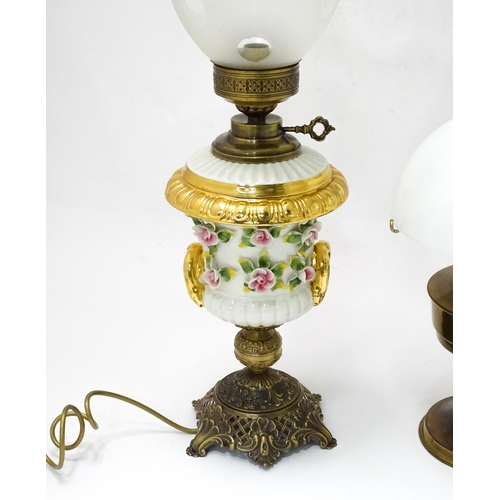 820 - Two electric table lamps formed as oil lamps, the
the largest approx 27