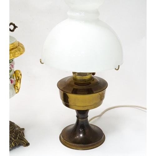 820 - Two electric table lamps formed as oil lamps, the
the largest approx 27