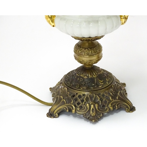 820 - Two electric table lamps formed as oil lamps, the
the largest approx 27