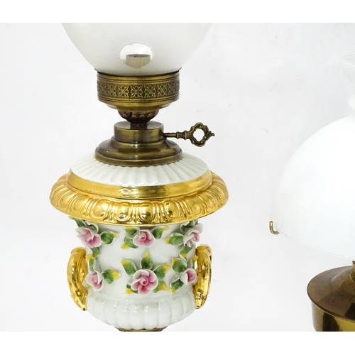 820 - Two electric table lamps formed as oil lamps, the
the largest approx 27