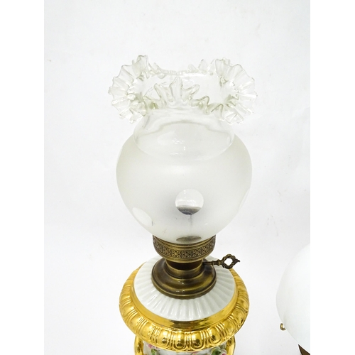 820 - Two electric table lamps formed as oil lamps, the
the largest approx 27