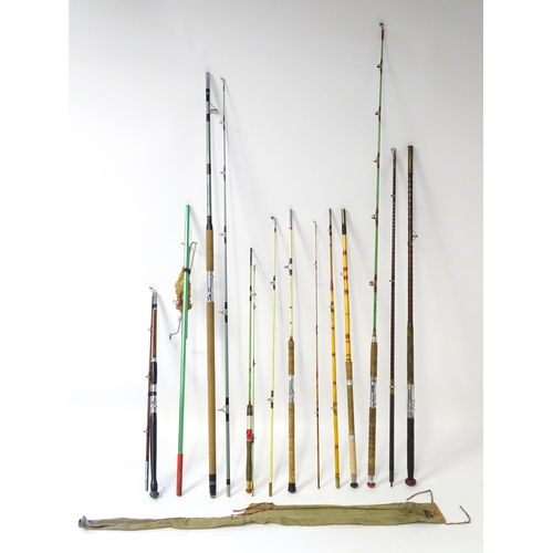 832 - Six 20thC sea fishing rods, to include a fibreglass Milbro 'Commander' boat road with cloth case, a ... 