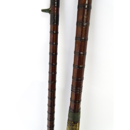 832 - Six 20thC sea fishing rods, to include a fibreglass Milbro 'Commander' boat road with cloth case, a ... 