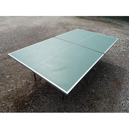 834 - A folding table tennis table with wheeled base, the top approx 108