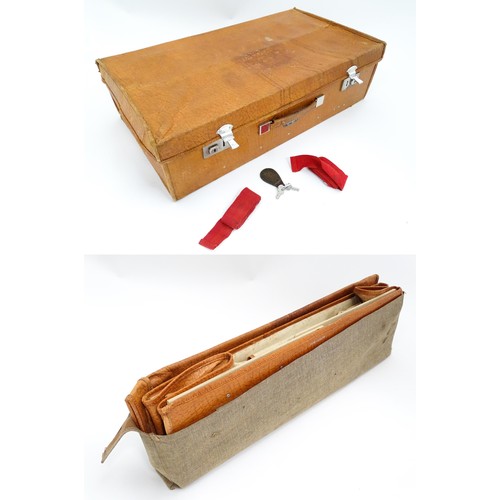 63 - An mid 20thC ' Stoawa ' folding leather suitcase, the lined interior with collapsing boards and with... 