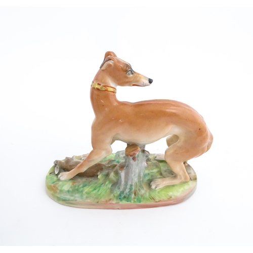 64 - A French model of a greyhound with a rabbit / hare, on a naturalistic oval base. In the manner of Ja... 