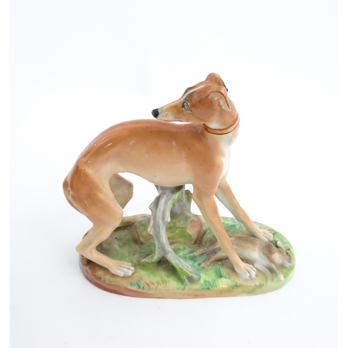 64 - A French model of a greyhound with a rabbit / hare, on a naturalistic oval base. In the manner of Ja... 