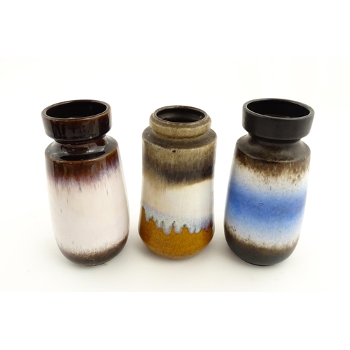 183 - Three West German Scheurich vases to include a brown glazed vase with central blue and white detail,... 