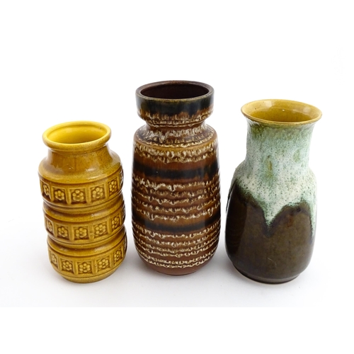 184 - Three West German vases to include a Scheurich ochre glazed vase with banded relief floral decoratio... 