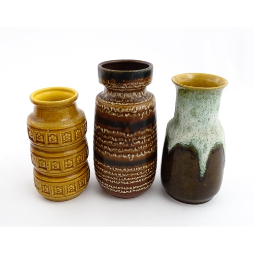 184 - Three West German vases to include a Scheurich ochre glazed vase with banded relief floral decoratio... 