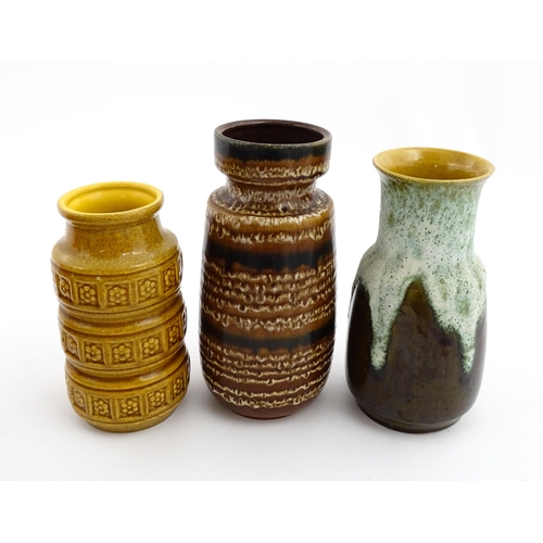 184 - Three West German vases to include a Scheurich ochre glazed vase with banded relief floral decoratio... 