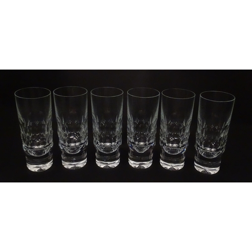 217 - A set of six highball glasses with facet cut decoration. Approx. 6 3/4