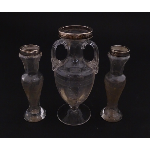 221 - A pair of glass bud vases with etched floral detail and silver rims hallmarked London 1901. Together... 