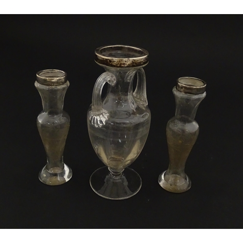 221 - A pair of glass bud vases with etched floral detail and silver rims hallmarked London 1901. Together... 